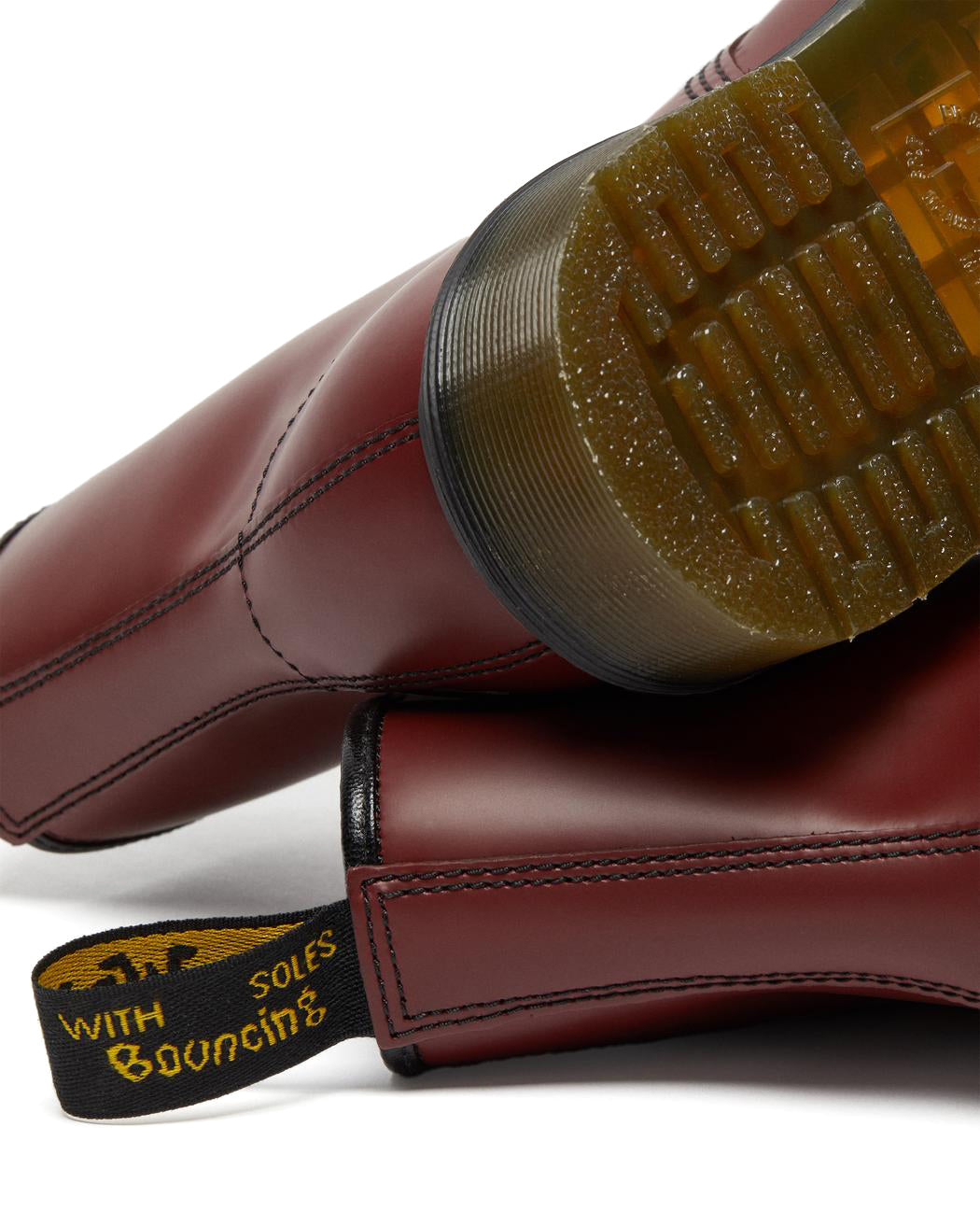 Cherry red ankle-height leather boot from Dr. Martens.