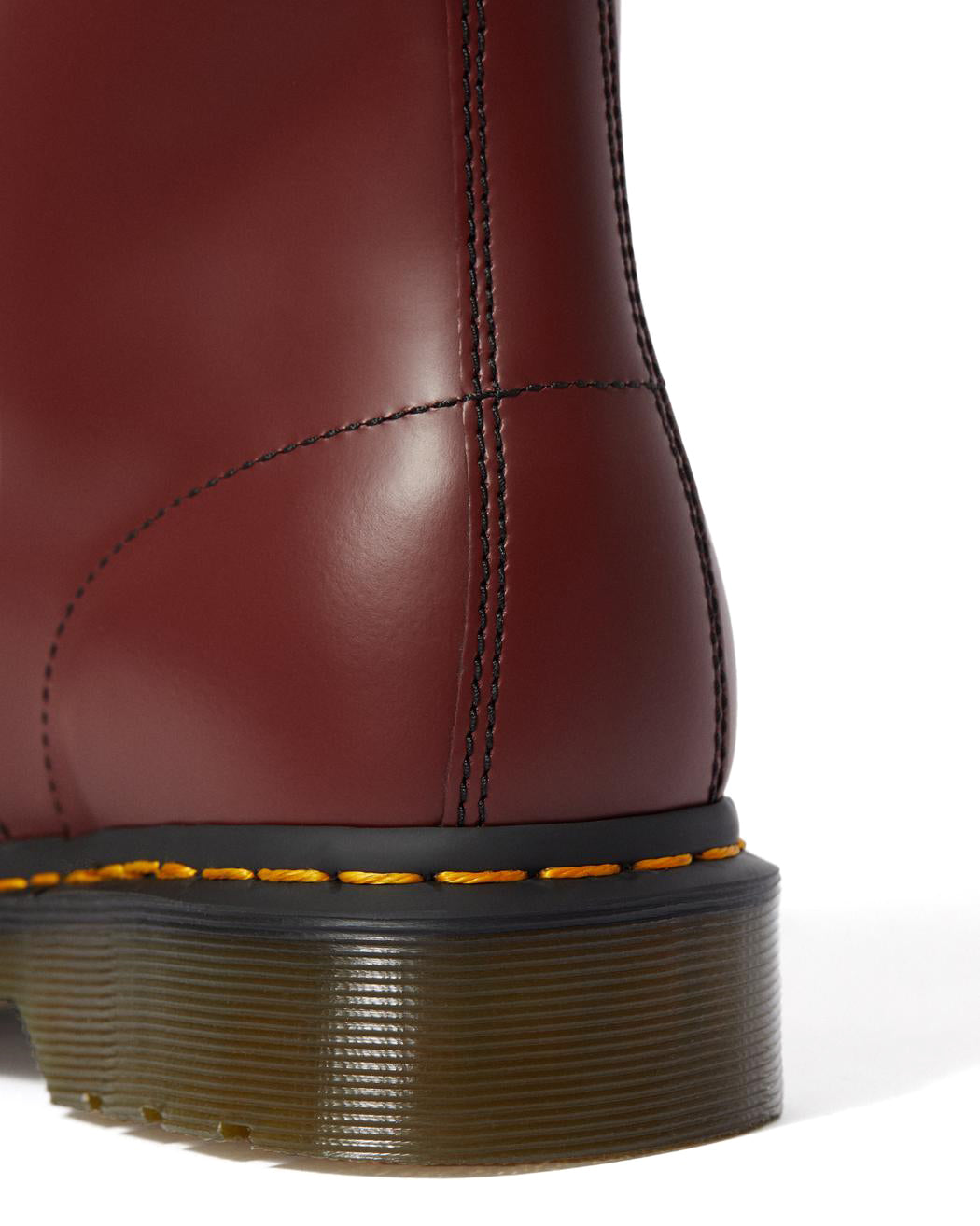 Cherry red ankle-height leather boot from Dr. Martens.