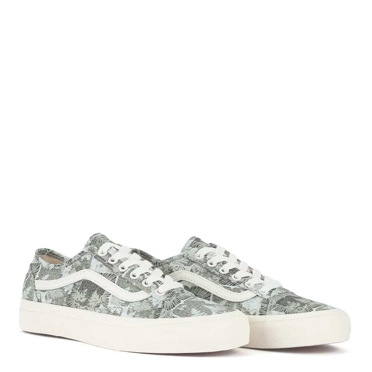 A green floral low-top Vans sneaker.