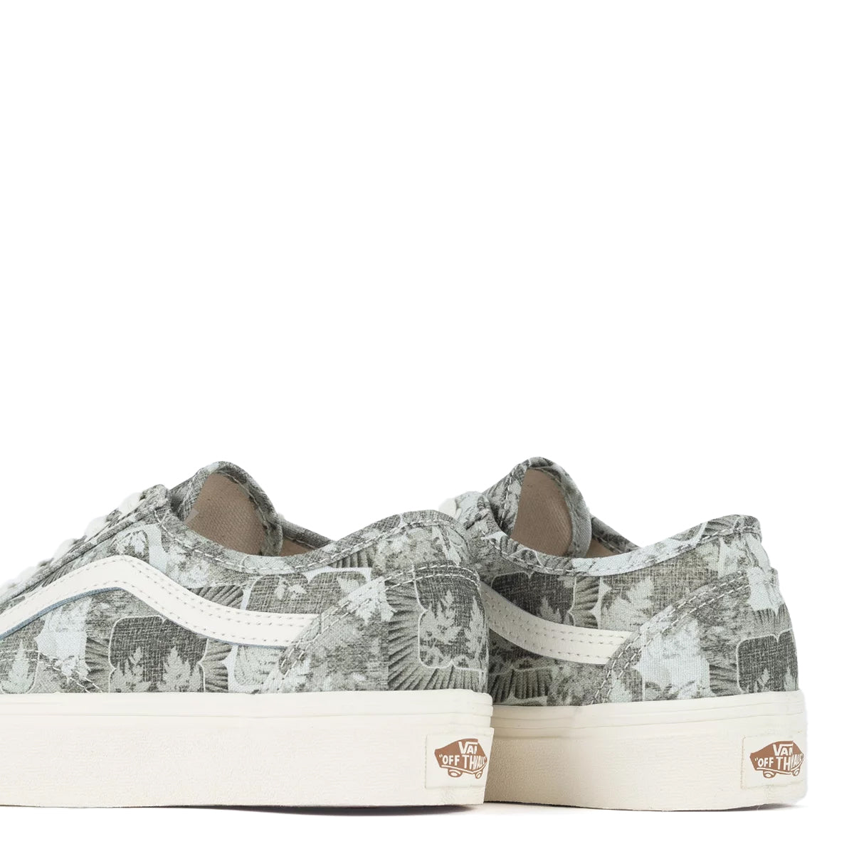 A green floral low-top Vans sneaker.