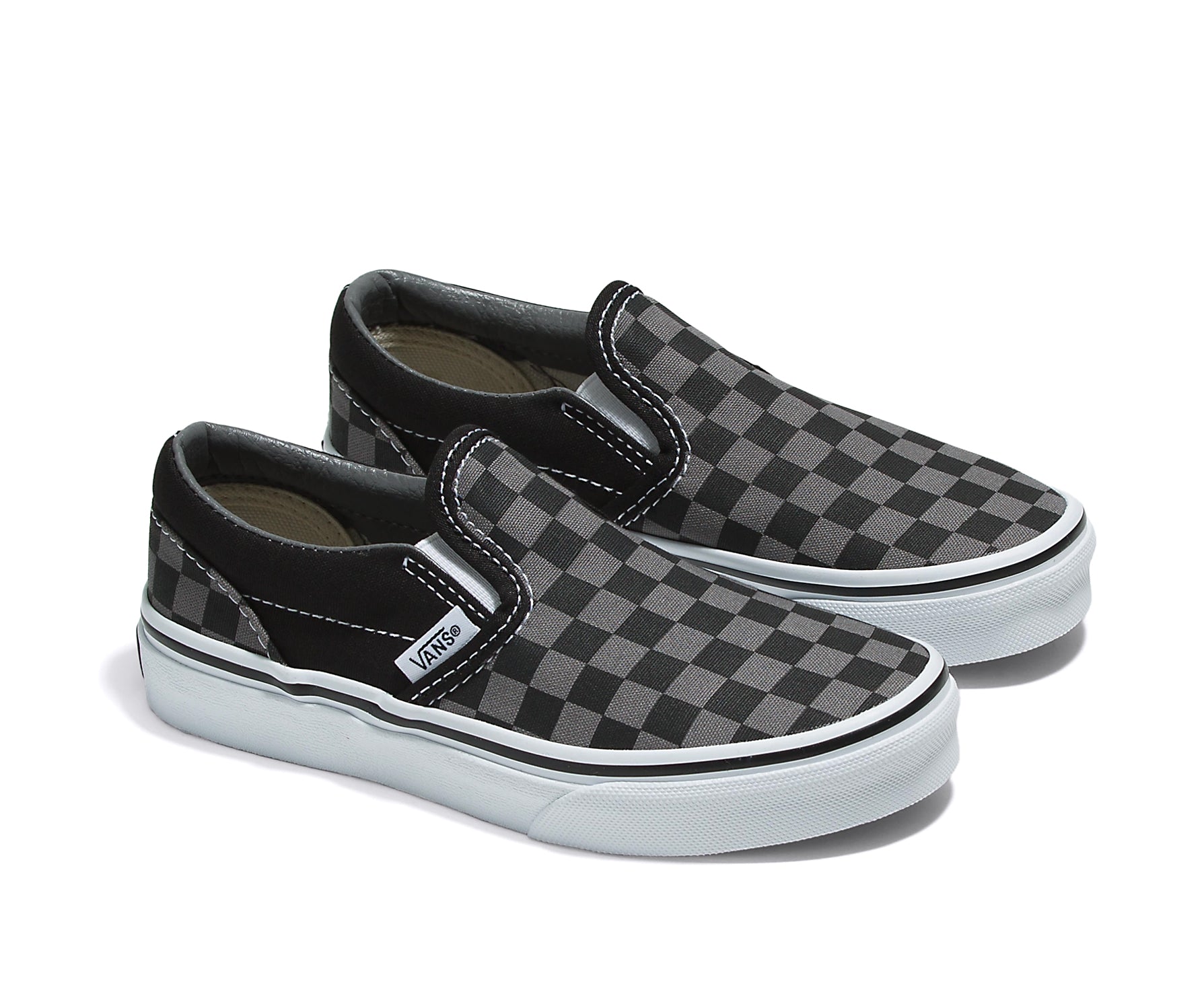 A checkerboard black and pewter canvas kids' slip-on shoe.