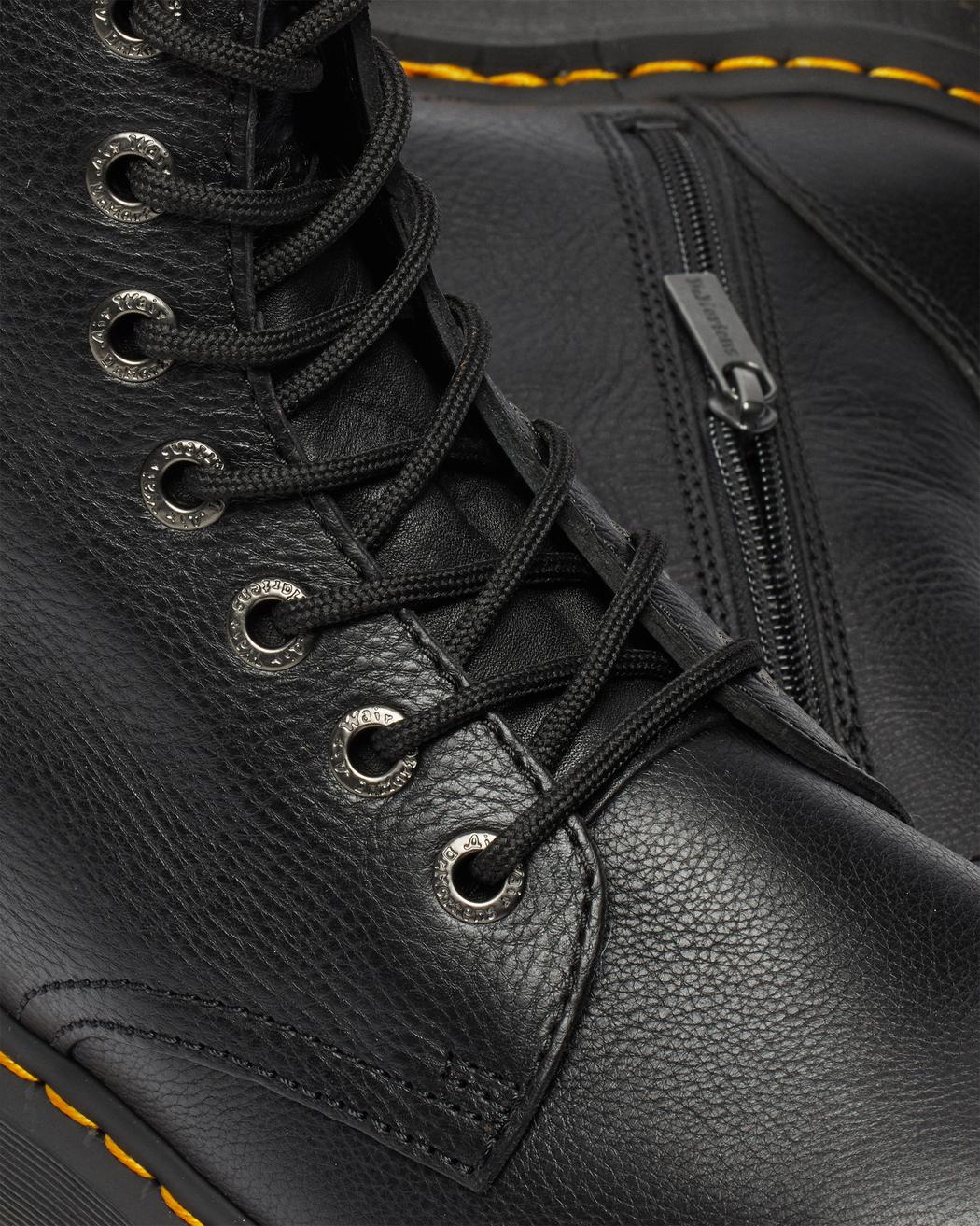 A mid-ankle height, laced, black leather platform boot.