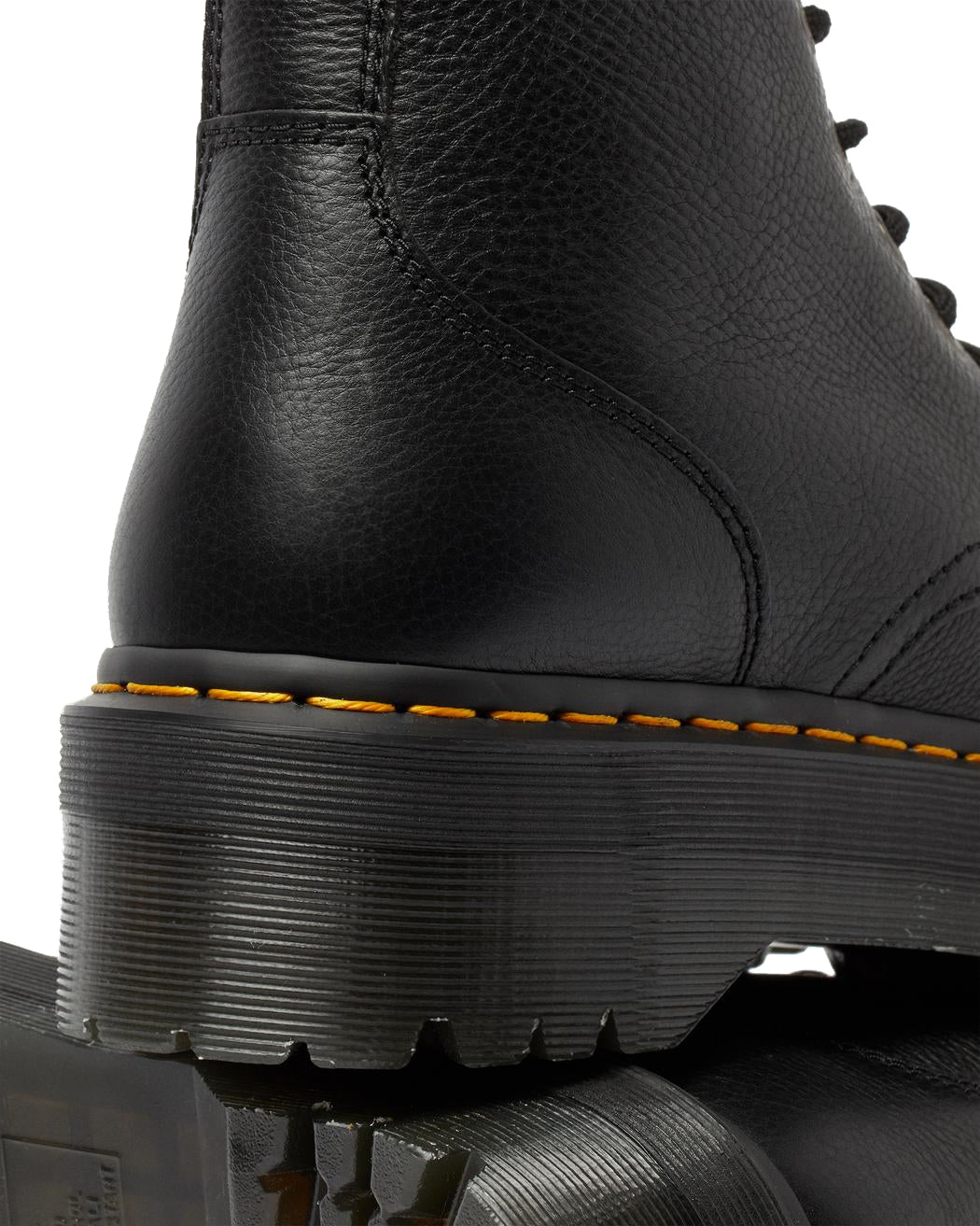 A mid-ankle height, laced, black leather platform boot.