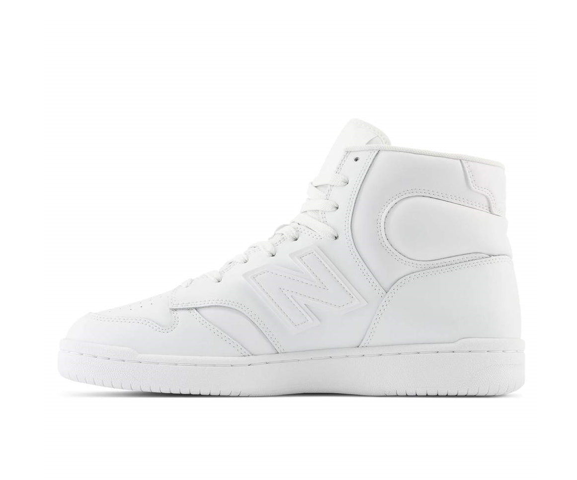 A monochrome white leather high-cut basketball sneaker from New Balance.