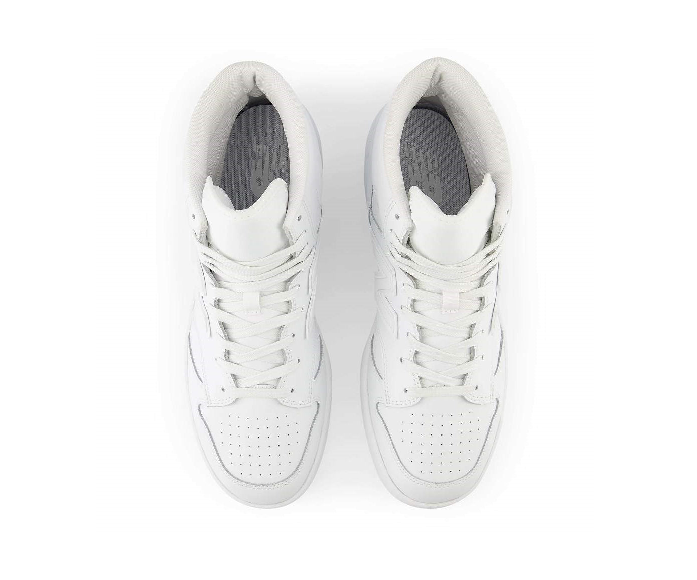 A monochrome white leather high-cut basketball sneaker from New Balance.