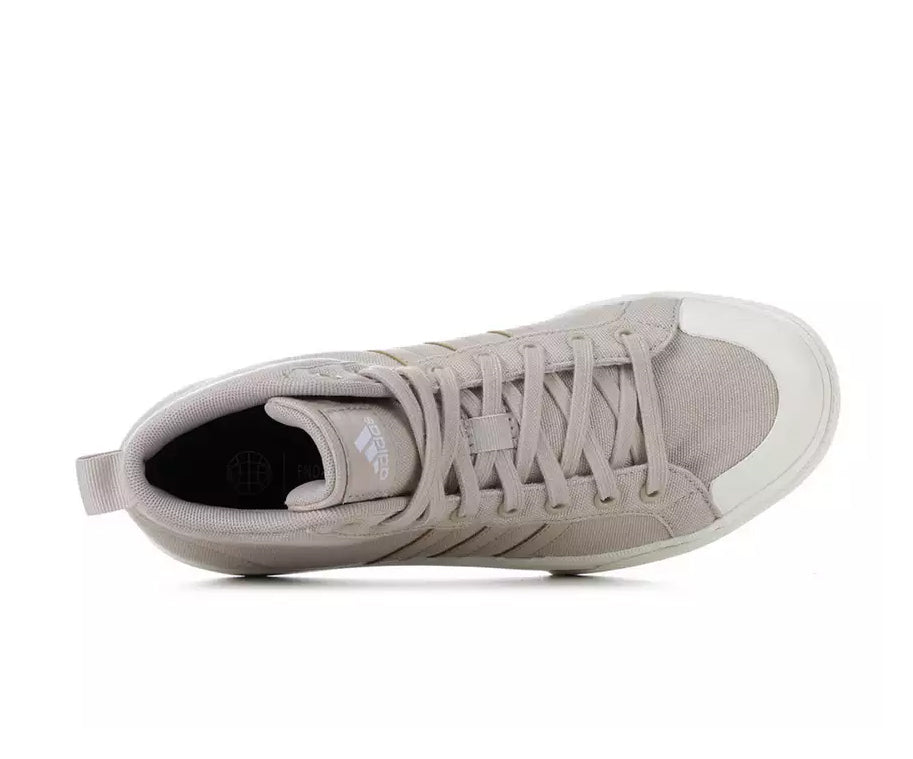 A taupe canvas high-top Adidas sneaker.