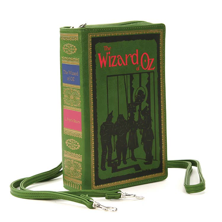 A green, rectangular cross-body bag with the Wizard of Oz book art