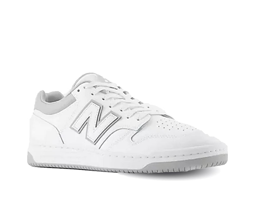 A white leather New Balance basketball shoe with gray accents.